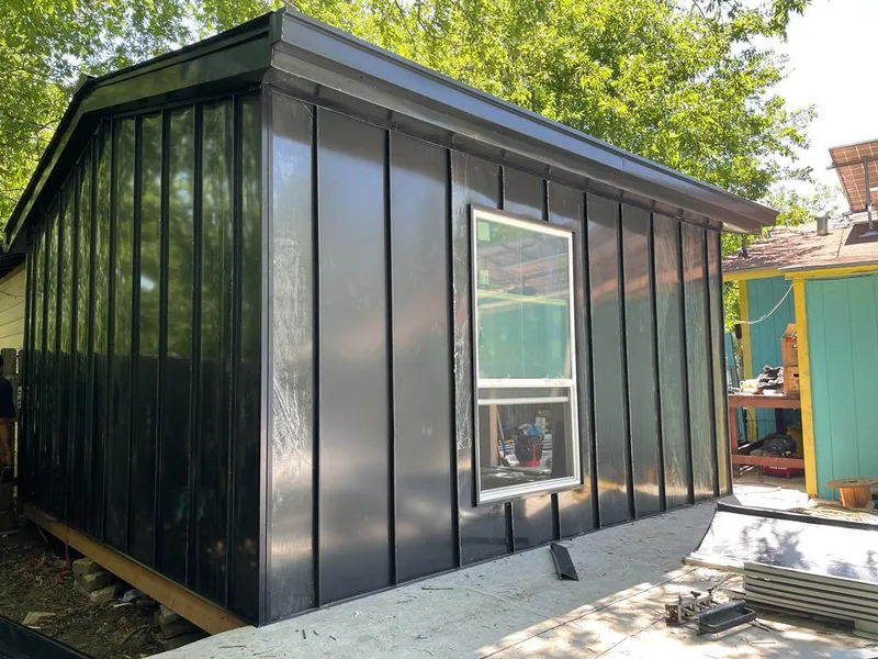 Black standing seam metal wall panels for Roof Inspection in Zebulon